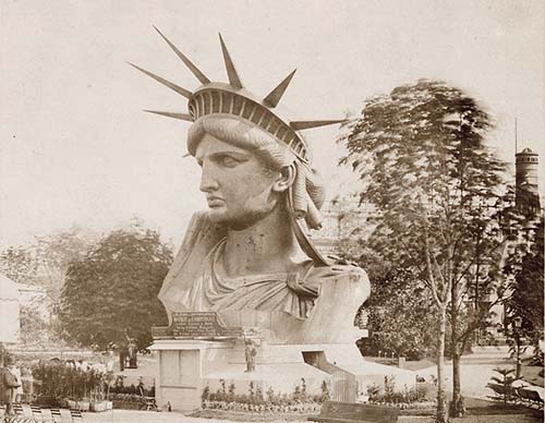 Head_of_the_Statue_of_Liberty_on_display_in_a_park_in_Paris.jpg